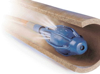 An illlustration of a sewer cleaning nozzle spraying water into a pipe.