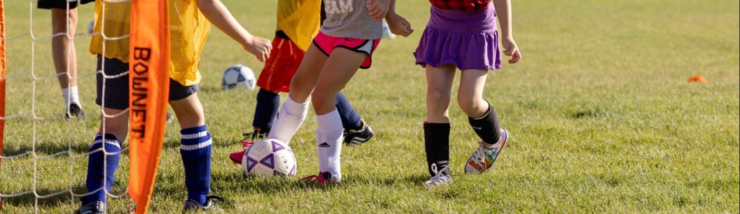 Children playing soccer