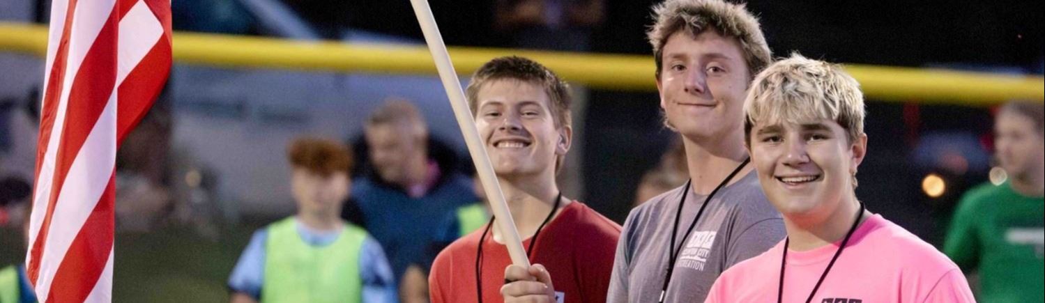 A group of people smiling